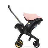 blush pink doona stroller
