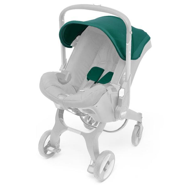 Racing green canopy and shoulder pads for Doona.