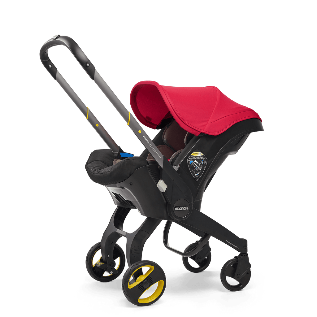 Black and red stroller with deals car seat